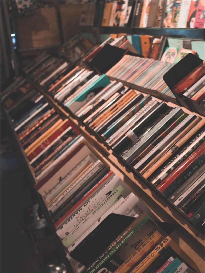 bookshelf showing books by category